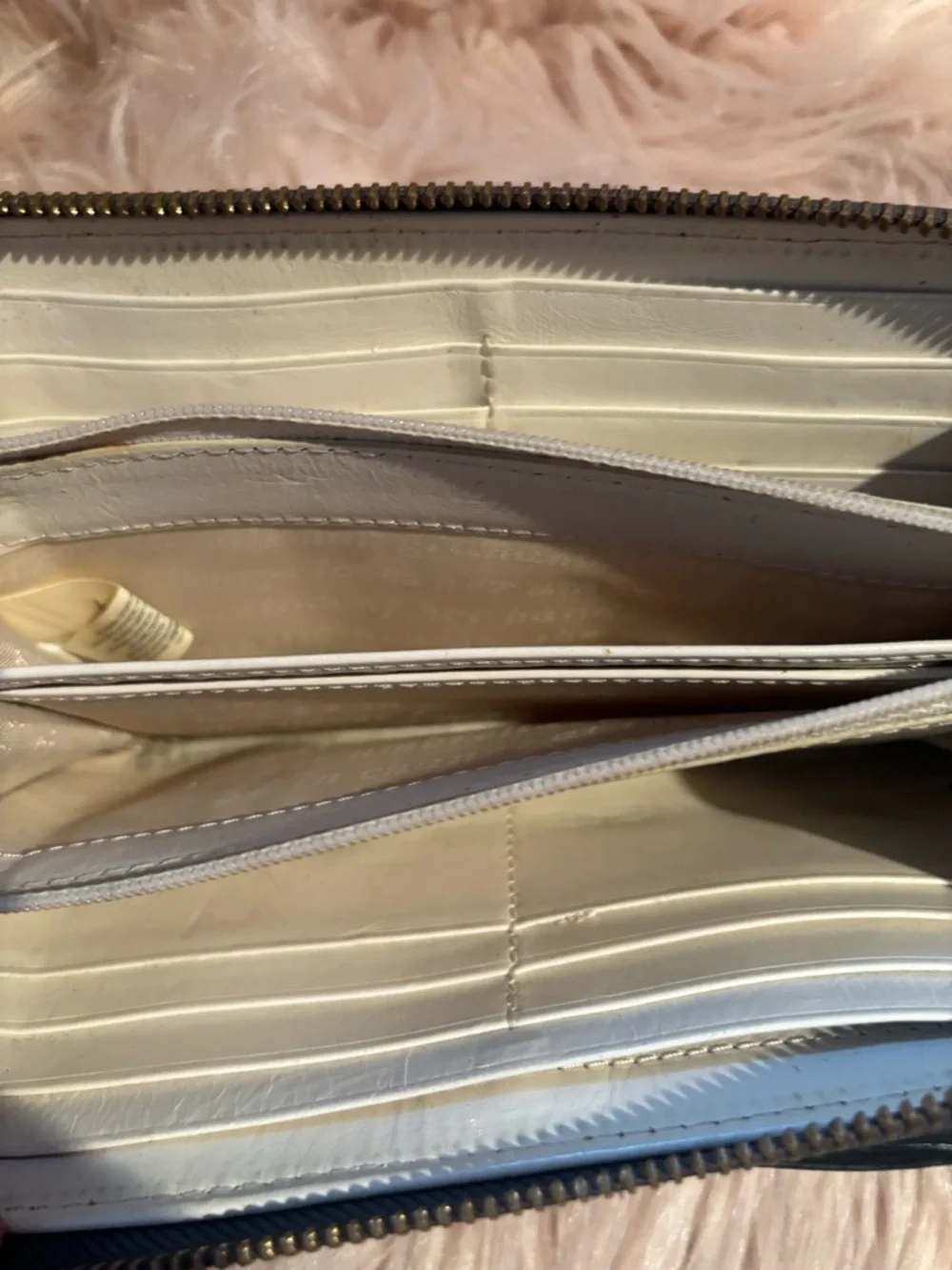 grey Kate Spade Beacon Court patent leather wallet